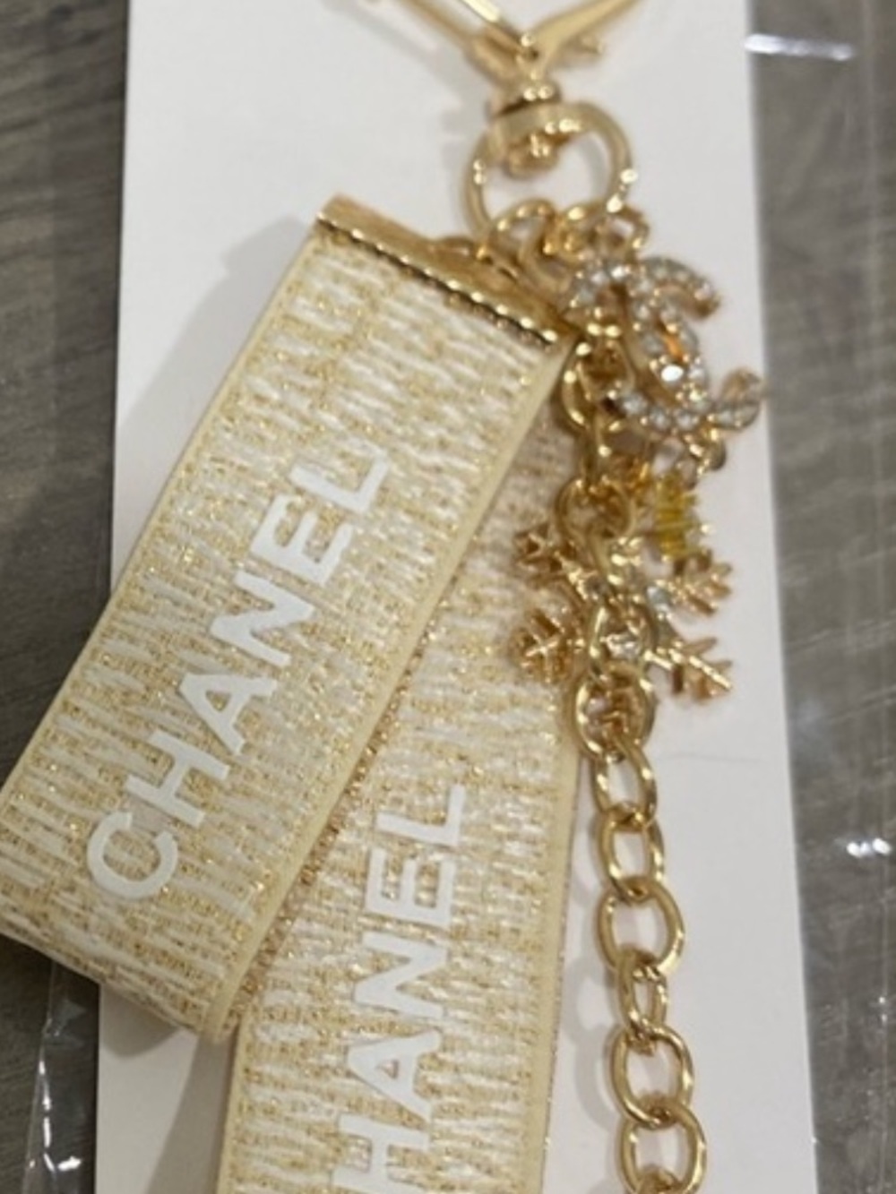 CHANEL Gold & Cream Logo Strap Key Charm